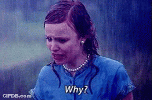 A Woman In A Blue Shirt Is Crying In The Rain And Asking Why ? GIF
