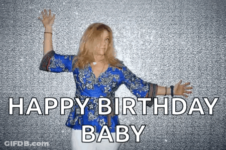 A Woman In A Blue Shirt Is Dancing With Her Arms Outstretched And The Words `` Happy Birthday Baby '' . GIF