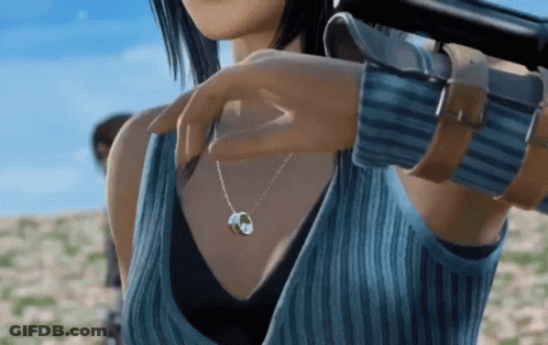 A Woman In A Blue Shirt Is Holding A Gun In Her Hand GIF