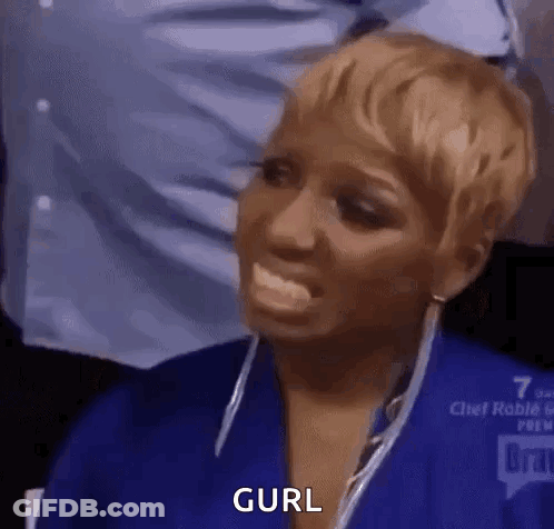 A Woman In A Blue Shirt Is Making A Funny Face With Her Tongue Out And The Word Curl Written On Her Face . GIF