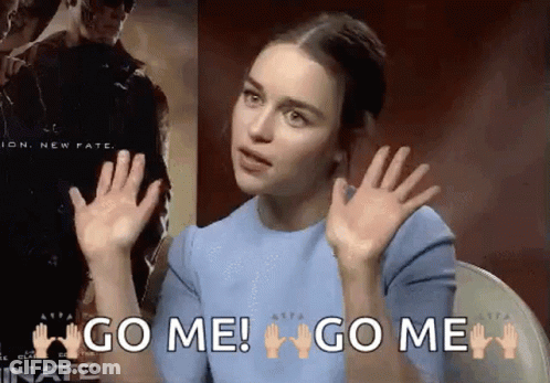A Woman In A Blue Shirt Is Making A Gesture With Her Hands And Says `` Go Me ! '' GIF