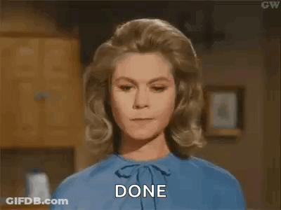 A Woman In A Blue Shirt Is Saying `` Done '' . GIF
