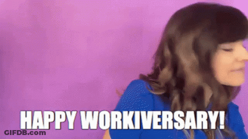A Woman In A Blue Shirt Is Saying " Happy Workiversary " GIF