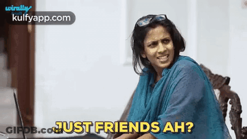 Woman In Blue Shirt Sitting With Laptop GIF