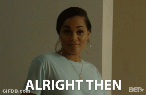 A Woman In A Blue Shirt Is Smiling And The Words Alright Then Are Behind Her GIF