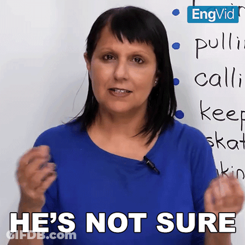 A Woman In A Blue Shirt Says He 'S Not Sure In Front Of A White Board GIF
