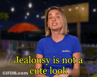 A Woman In A Blue Shirt Says " Jealousy Is Not A Cute Look " GIF