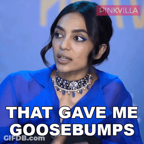 A Woman In A Blue Shirt Says That Gave Me Goosebumps In White Letters GIF
