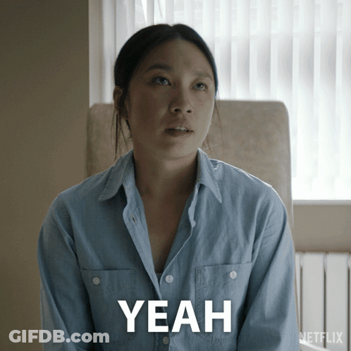 Woman In Blue Shirt Saying Yeah GIF