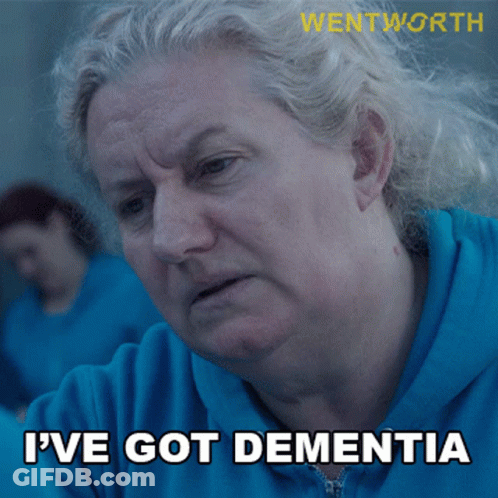 A Woman In A Blue Shirt With The Words I 'Ve Got Dementia GIF