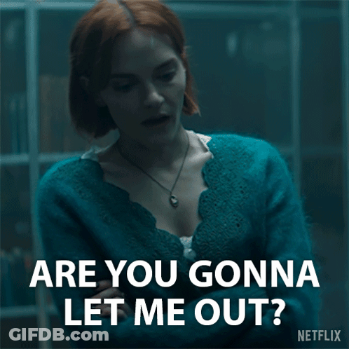 A Woman In A Blue Sweater Is Asking Are You Gonna Let Me Out ? GIF