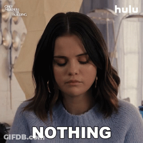 A Woman In A Blue Sweater Says Nothing In A Hulu Ad GIF