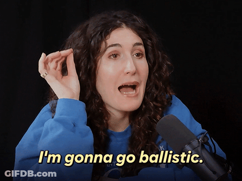 A Woman In A Blue Sweatshirt Says I 'M Gonna Go Ballistic In Front Of A Microphone GIF