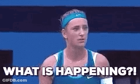 A Woman In A Blue Tank Top Is Standing On A Tennis Court And Asking What Is Happening . GIF