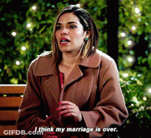 A Woman In A Brown Coat Is Sitting On A Bench And Saying I Think My Marriage Is Over GIF