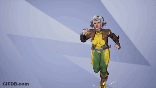 A Woman In A Brown Jacket And Green And Yellow Outfit Has A Belt Around Her Waist GIF