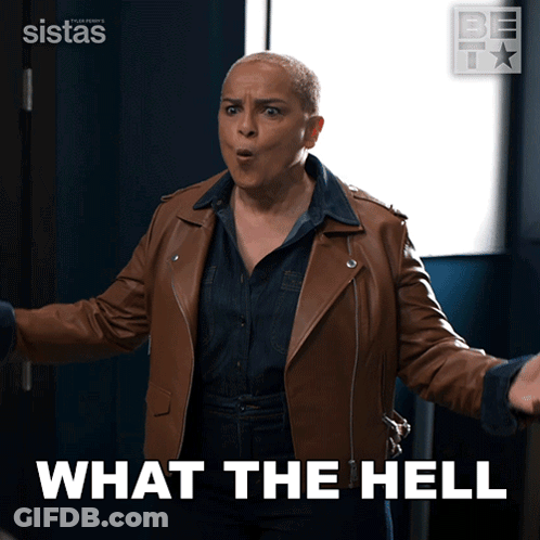 A Woman In A Brown Leather Jacket With The Words What The Hell Behind Her GIF