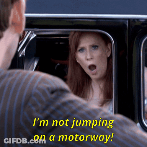 A Woman In A Car Says " I 'M Not Jumping On A Motorway ! " GIF