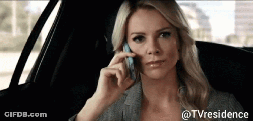 A Woman In A Car Talking On A Cell Phone GIF