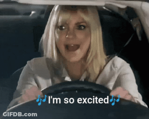 A Woman In A Car With The Words " I 'M So Excited " Above Her GIF