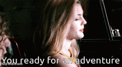 A Woman In A Car With The Words You Ready For An Adventure Written Below Her GIF