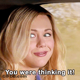 A Woman In A Car With The Words " You Were Thinking It " Below Her GIF