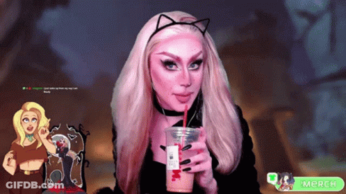 A Woman In A Cat Costume Is Drinking A Milkshake With A Straw GIF