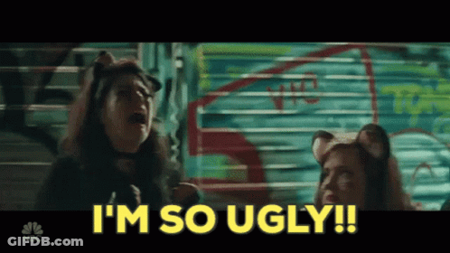 A Woman In A Cat Costume Says " I 'M So Ugly !! " GIF
