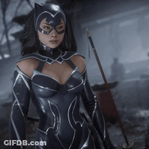 A Woman In A Catwoman Costume Holds A Sword GIF