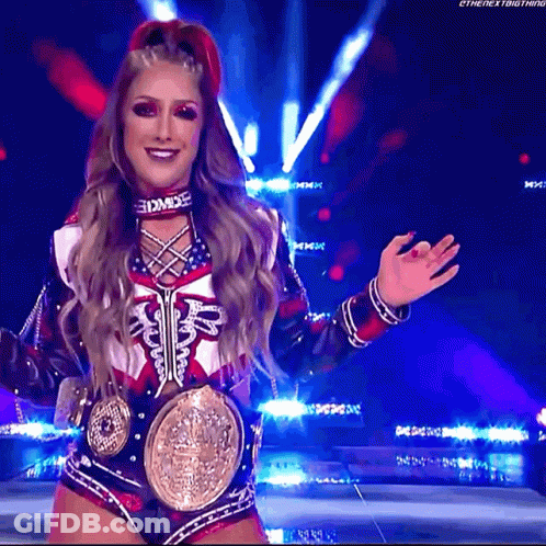 A Woman In A Cheerleader Outfit Is Holding A Wrestling Championship Belt GIF