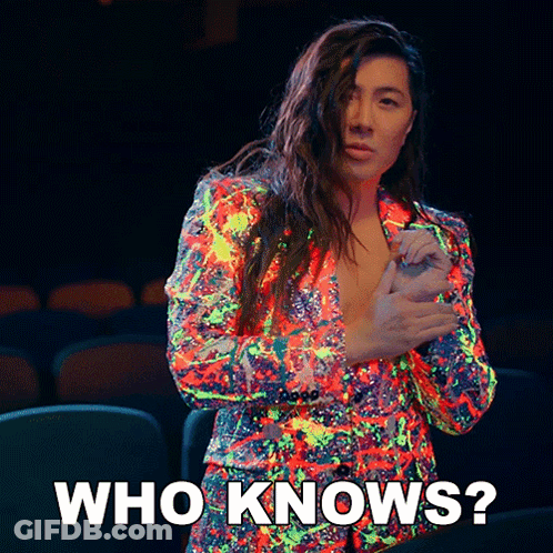 A Woman In A Colorful Jacket Is Asking Who Knows GIF