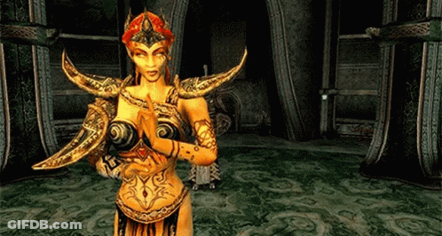 A Woman In A Costume With Horns Is Standing In A Dark Room . GIF