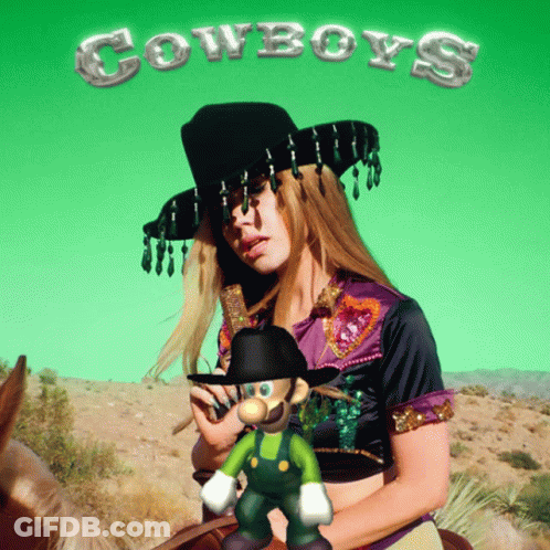 A Woman In A Cowboy Hat Is Riding A Horse Next To A Mario Character GIF