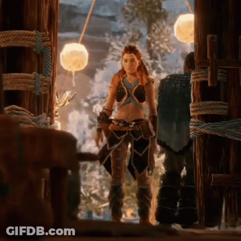 A Woman In A Crop Top Is Standing Next To A Man GIF