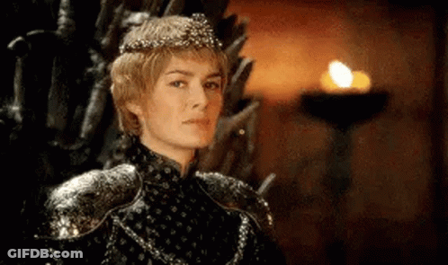 A Woman In A Crown Is Sitting On A Throne . GIF