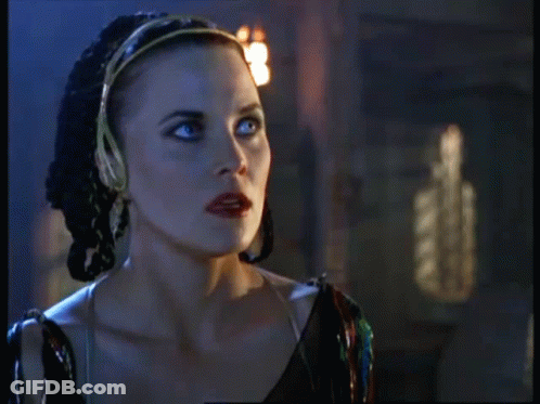 Woman In Dark Room Ares Written GIF