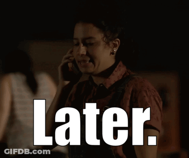 A Woman In A Dark Room With The Word Later On The Bottom Right GIF