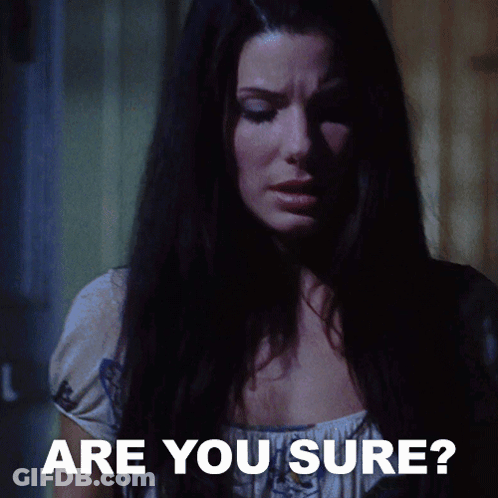 A Woman In A Dark Room With The Words " Are You Sure " Below Her GIF
