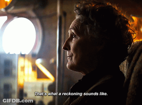 Woman In Dark Room With Reckoning Sounds GIF