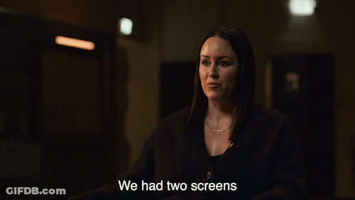 A Woman In A Dark Room With The Words We Had Two Screens Above Her GIF