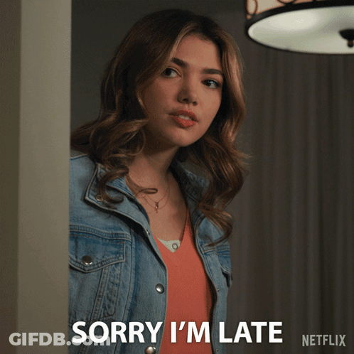 A Woman In A Denim Jacket Says Sorry I 'M Late In A Netflix Ad GIF