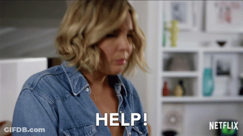A Woman In A Denim Shirt Says Help In Front Of A Netflix Logo GIF