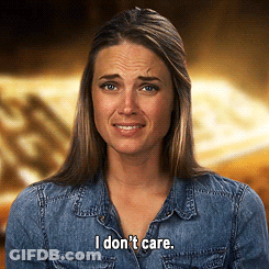 A Woman In A Denim Shirt Says I Don T Care GIF