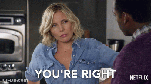 A Woman In A Denim Shirt Says " You 'Re Right " To A Man GIF