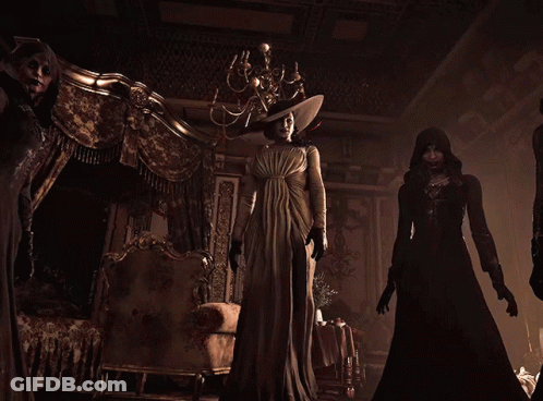 A Woman In A Dress And Hat Stands In A Room GIF