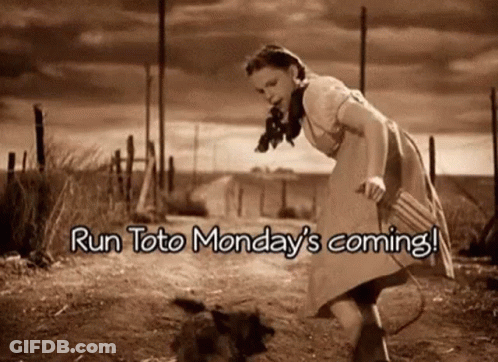 A Woman In A Dress Is Running Down A Dirt Road . GIF