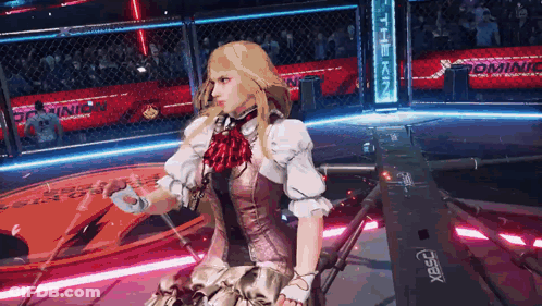 A Woman In A Dress Is Standing In A Boxing Ring With A Sign That Says Dominion GIF