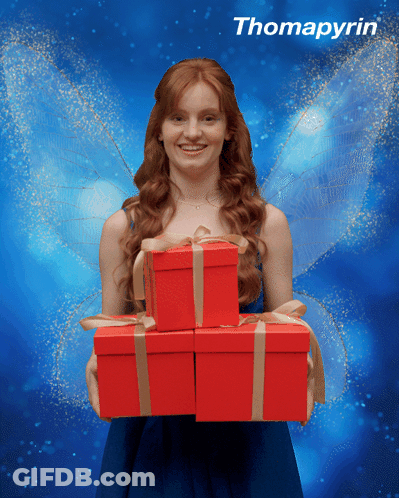 Woman In Fairy Costume Holding Red Thomapyrin Boxes GIF