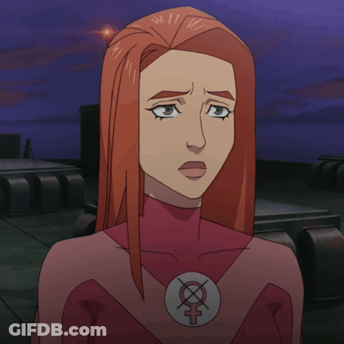 A Woman In A Female Superhero Costume Has A Female Symbol On Her Chest GIF
