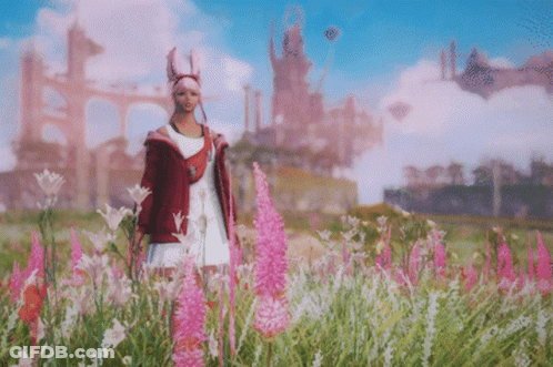 A Woman In A Field Of Flowers With Her Arms In The Air GIF